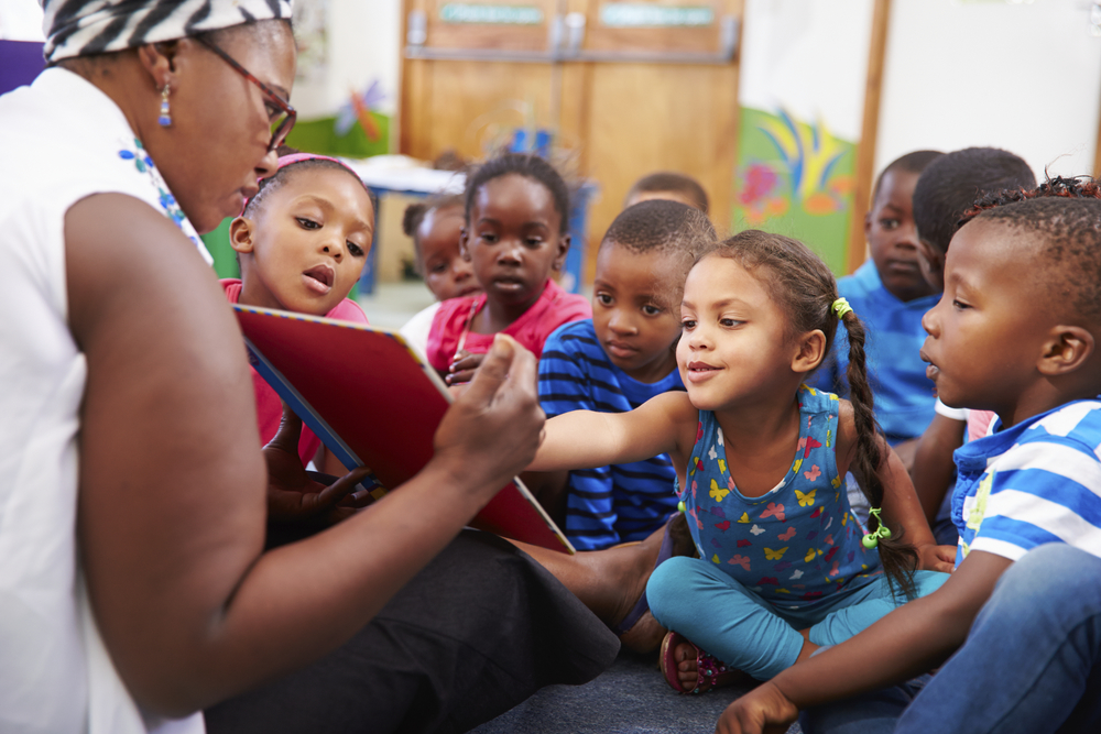Female teacher reading story.jpg